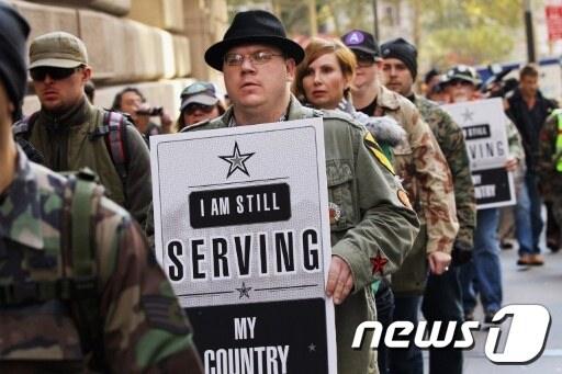 본문 이미지 - 반월가 시위에 동참한  '99%의 용사들' AFP © News1