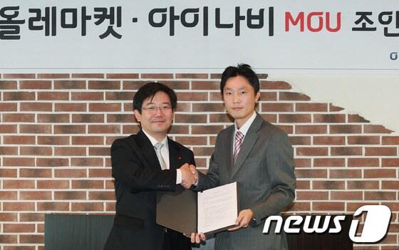 본문 이미지 - 왼쪽부터 김훈배 KT 전략앱개발담당 상무, 김대현 팅크웨어 사업부문 부문장 . © News1 