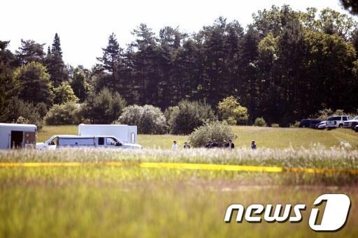 본문 이미지 - 지미 호파 전미화물운송노조 위원장 시신 발굴 작업 현장. © AFP=News1  
