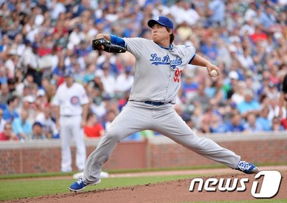 본문 이미지 - 류현진이 9일&#40;한국시간&#41; 부시스타디움에서 열린 세인트루이스 카디널스전에 시즌 22번째 선발 등판해 11승&#40;3패&#41;째를 올렸다.© AFP=News1
