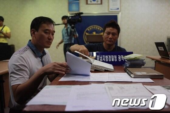 본문 이미지 - 뇌출혈 환자의 MRI 사진을 이용해 대리진단 수법으로 수억원대 보험금을 타낸 일당이 경찰에 붙잡혔다. 이와 관련 5일 충남경찰청 광역수사대 는 브리핑을 열고 검거 사실을 알렸다. © News1 