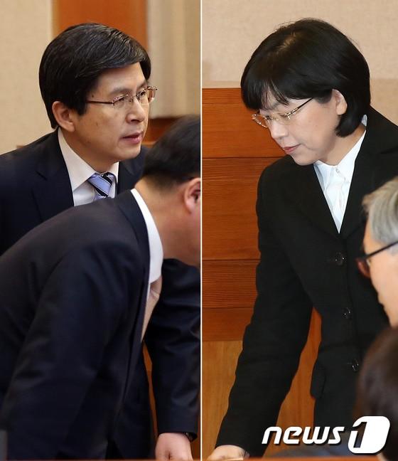 본문 이미지 - 황교안 법무부 장관(왼쪽편)과 이정희 통합진보당 대표가 28일 오후 서울 종로구 재동 헌법재판소 대심판정에서 열린 통합진보당의 정당해산심판 공개변론에 입장하고 있다. © News1 한재호 기자