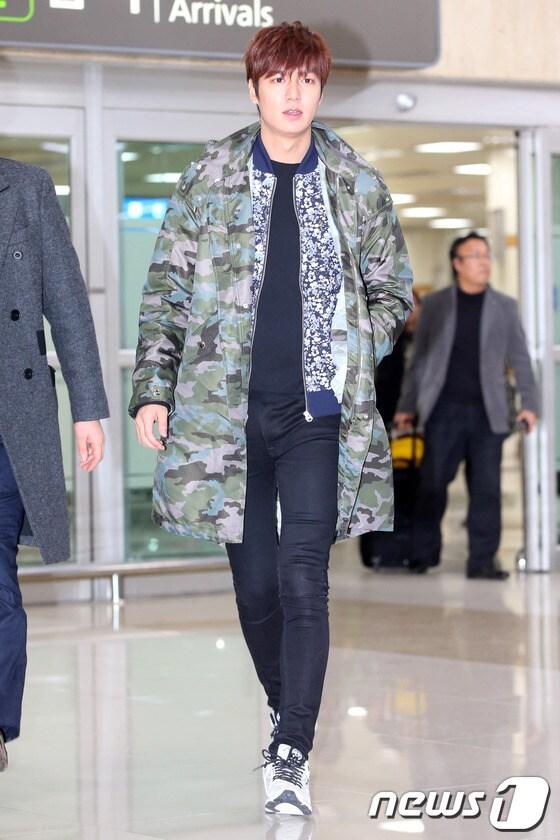 본문 이미지 - 배우 이민호가 중국 항저우에서 기자회견 및 광고 촬영 등 1박2일 일정을 마치고 8일 저녁 서울 김포국제공항을 통해 입국하고 있다. 2014.3.9 스타뉴스/뉴스1 © News1   
