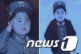 본문 이미지 - 조선중앙TV가 21일 오후 &#39;김정은 원수님을 모시고 진행한 제1차 비행사대회 참가자들을 위한 모란봉악단 축하공연’을 녹화중계하면서 김 제1위원장의 어린 시절 모습을 처음으로 공개했다. 2014.4.22/뉴스1  © News1   김보영 