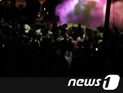 본문 이미지 - 폭력 사태로 번진 캘리포니아 길거리 파티 © News1 
