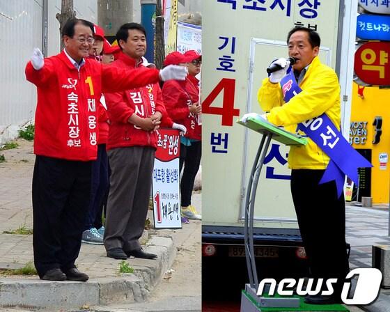 본문 이미지 - 6·4지방선거를 이틀 앞둔 2일 새누리당 채용생 속초시장 후보(좌)가 주공4차 사거리에서, 무소속 이병선 후보(우)는 시가지에서 시민들을 향해 유세활동을 펼치고 있다. 2014.6.2/뉴스1 © News1   엄용주 