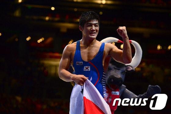 본문 이미지 - 한국 레슬링의 간판 김현우가 2014 인천 아시안게임에서 그랜드슬램에 도전한다. ⓒ AFP=News1