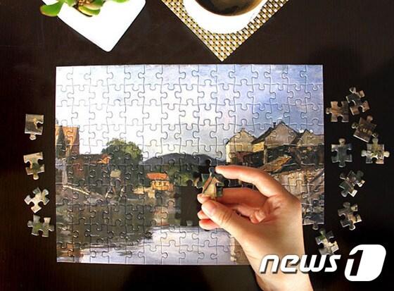 본문 이미지 - 그랜드 힐튼 서울은 직소 퍼즐을 선물로 제공하는 겨울맞이 힐링 패키지를 기획했다. 사진 제공/ 그랜드 힐튼 서울 ⓒ News1