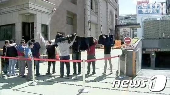 본문 이미지 - 총격이 발생한 대만 메이푸찬음그룹 본사. (사진출처 대만 둥선방송) ⓒ뉴스1