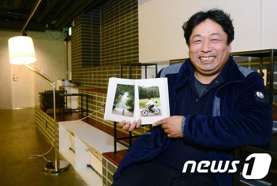 본문 이미지 - 청와대 전속 사진사인 장철영 청와대 행정관2017.1.17/뉴스1 ⓒ News1 박세연 기자