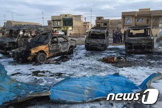 본문 이미지 - 이라크 수도 바그다드 남부 중고차 판매시장에서 수니파 급진 무장세력 이슬람국가(IS)가 테러를 벌여 100여명의 사상자가 발생했다. ⓒ AFP=뉴스1