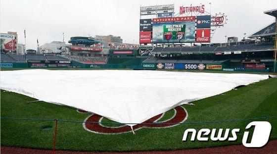 본문 이미지 - 12일(한국시간) 워싱턴에서 열릴 예정이었던 워싱턴-볼티모어전이 우천 취소됐다. ⓒ AFP=News1