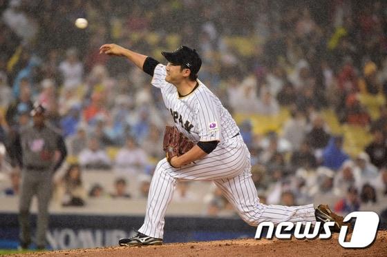 본문 이미지 - 제4회 월드베이스볼클래식(WBC)에 일본 대표팀으로 참가한 스가노 도모유키.ⓒ AFP=News1