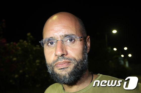 본문 이미지 - 리비아 독재자 무아마르 카다피의 차남 사이프 알이슬람(자료사진) ⓒ AFP=뉴스1