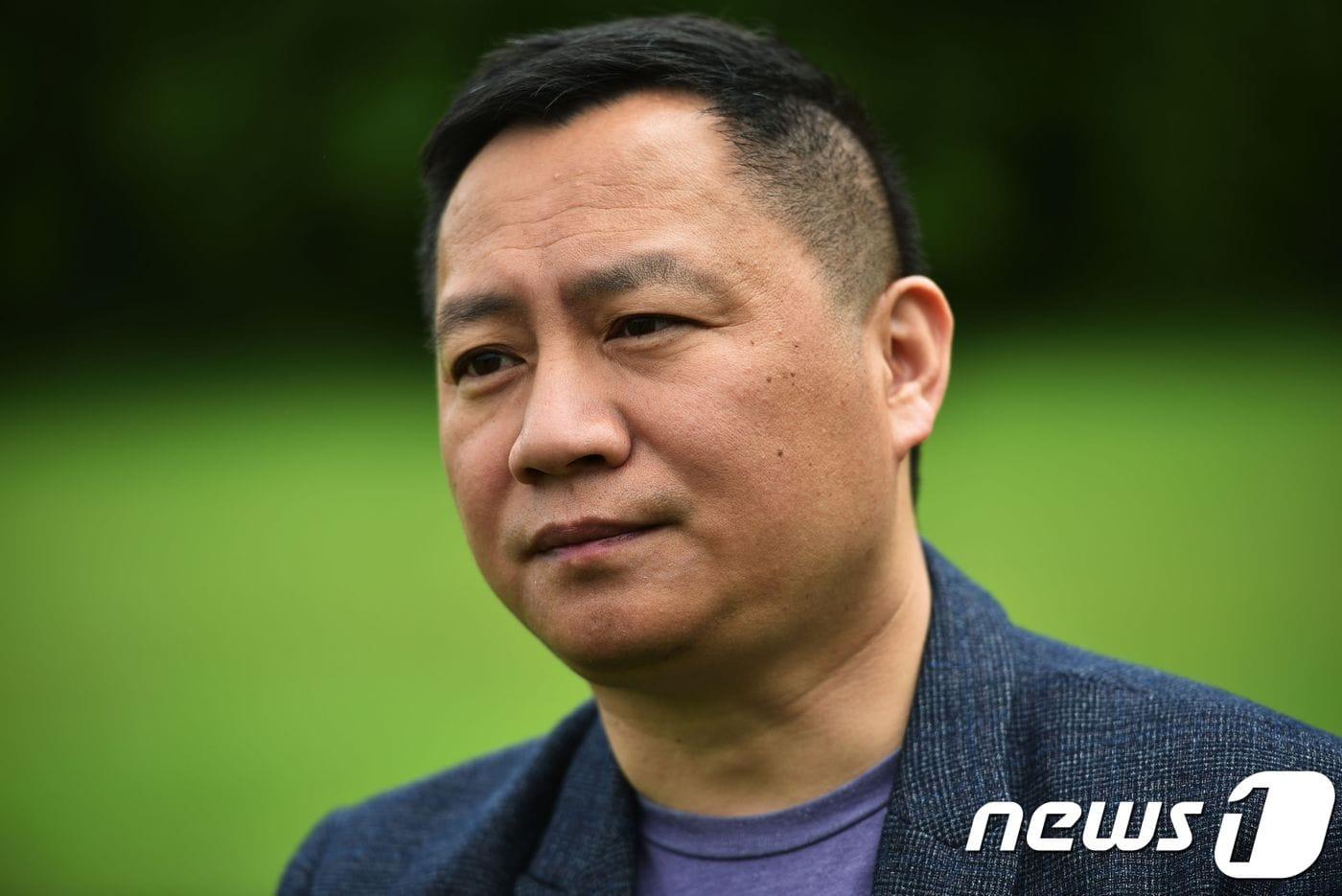 본문 이미지 - 30년 전 톈안먼 민주화 시위를 주도한 반체제 운동가 왕단. ⓒ AFP=뉴스1