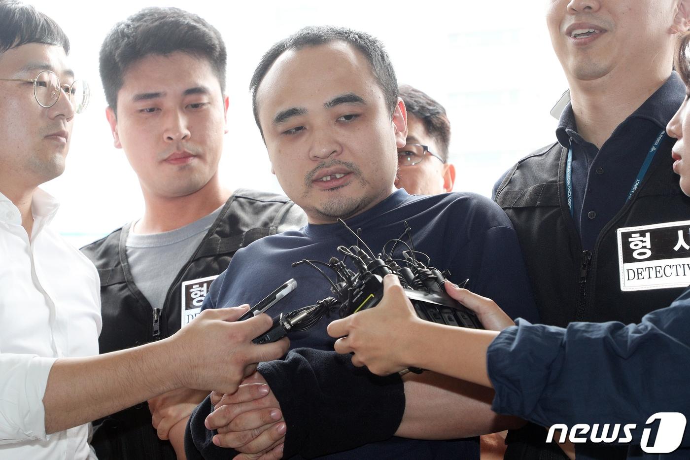 모텔 손님을 살해한 뒤 시신을 훼손해 한강에 유기한 혐의로 재판에 넘겨진 장대호/뉴스1 ⓒ News1 황기선 기자