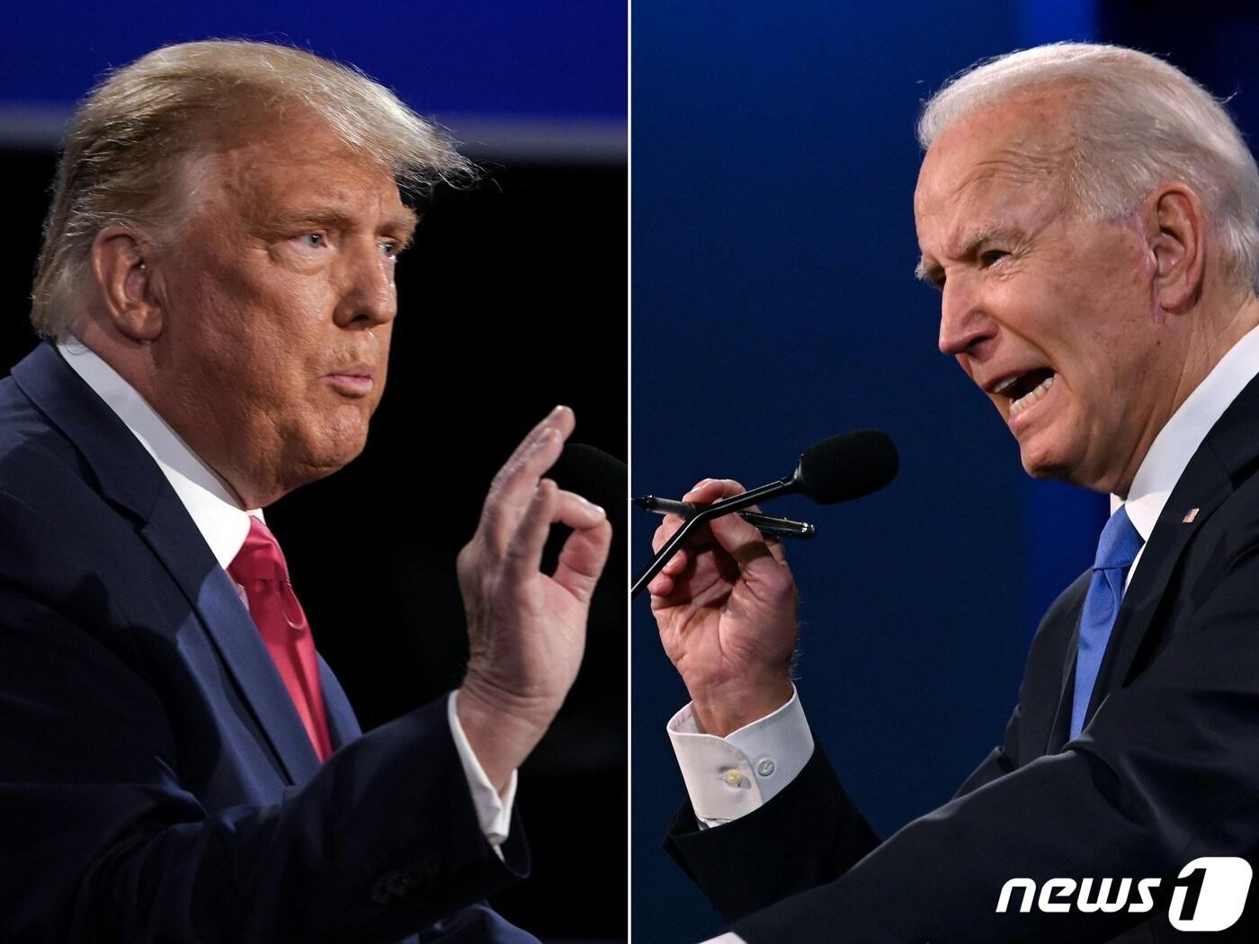 본문 이미지 - 도널드 트럼프 미국 대통령과 조 바이든 민주당 대선후보가 22일 테네시주 벨몬트대에서 TV토론을 벌이고 있다. ⓒ AFP=뉴스1