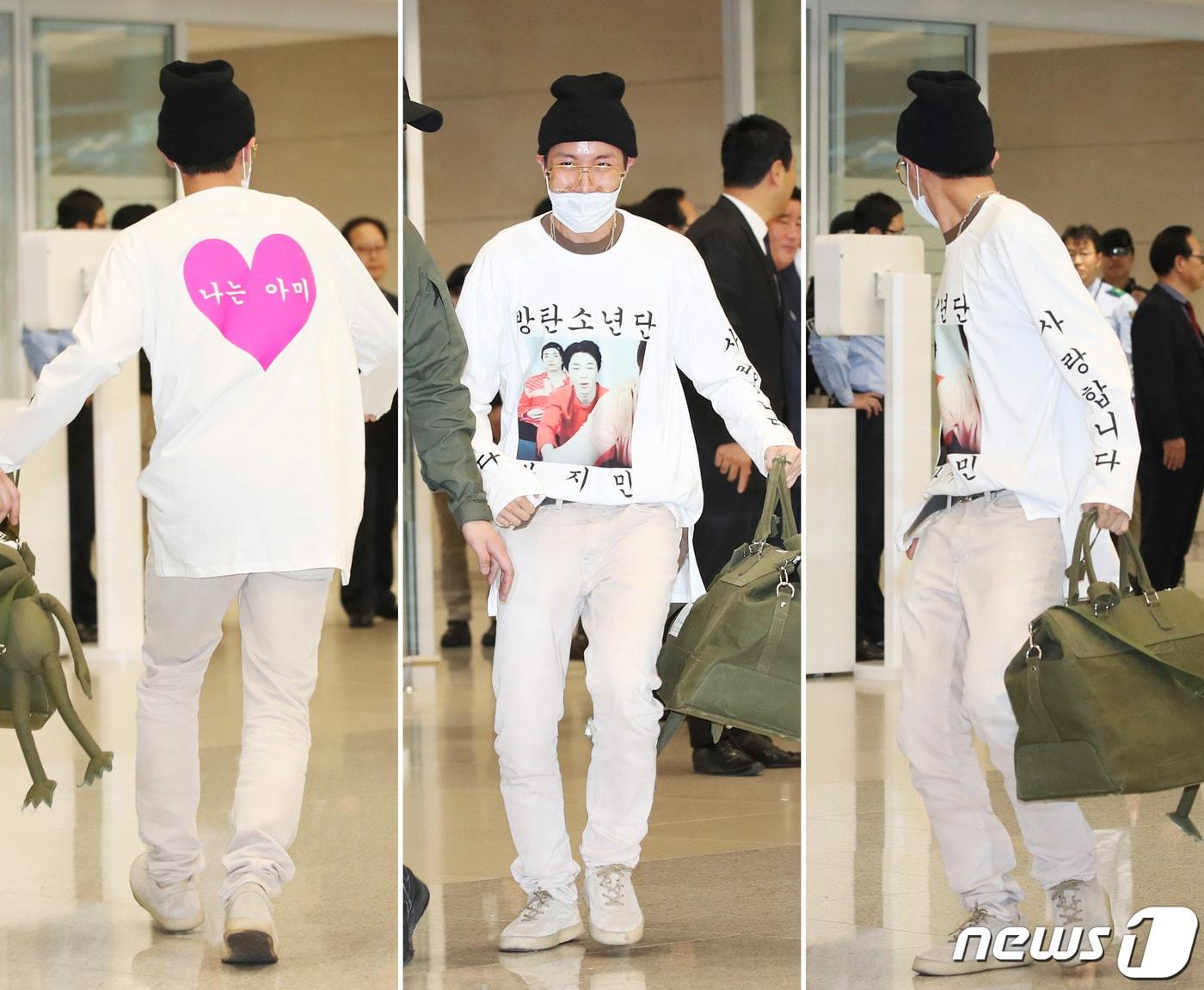 본문 이미지 - K-POP 역사를 새로 쓰고 있는 방탄소년단(BTS) 제이홉이 24일 오전 인천국제공항 통해 북미와 유럽투어를 성공적으로 마치고 입국하며 '아미 사랑' 팬서비스를 하고 있다. 2018.10.24/뉴스1 ⓒ News1 권현진 기자