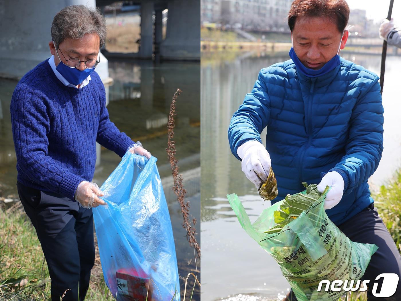 본문 이미지 - 더불어민주당 송기헌 강원 원주을 후보(왼쪽)와 이광재 원주갑 후보가 4·15총선 공식 선거운동이 시작된 2일 오전 원주시 평원동 원주천 둔치에서 선거유세 대신 원주천 정화활동을 하고 있다.2020.4.2/뉴스1 ⓒ News1 권혜민 기자