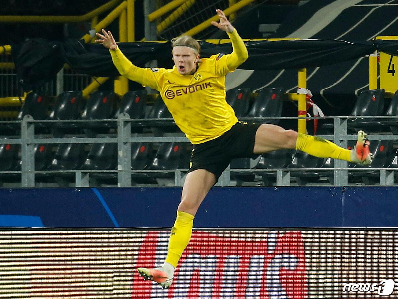 본문 이미지 - 홀란드의 2골을 앞세운 보루시아 도르트문트가 UCL 8강 진출에 성공했다.ⓒ 로이터=뉴스1