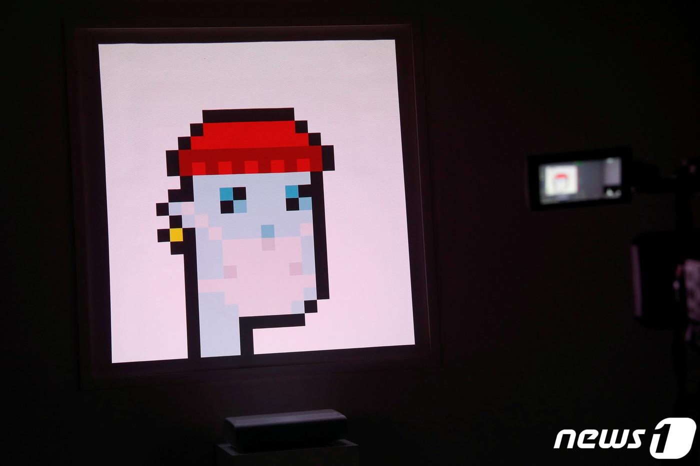대체불가토큰(NFT) '크립토펑크 #7523'가 소더비에서 1180만 달러(132억 원)에 낙찰됐다. ⓒ 로이터=뉴스1 ⓒ News1 정윤영 기자
