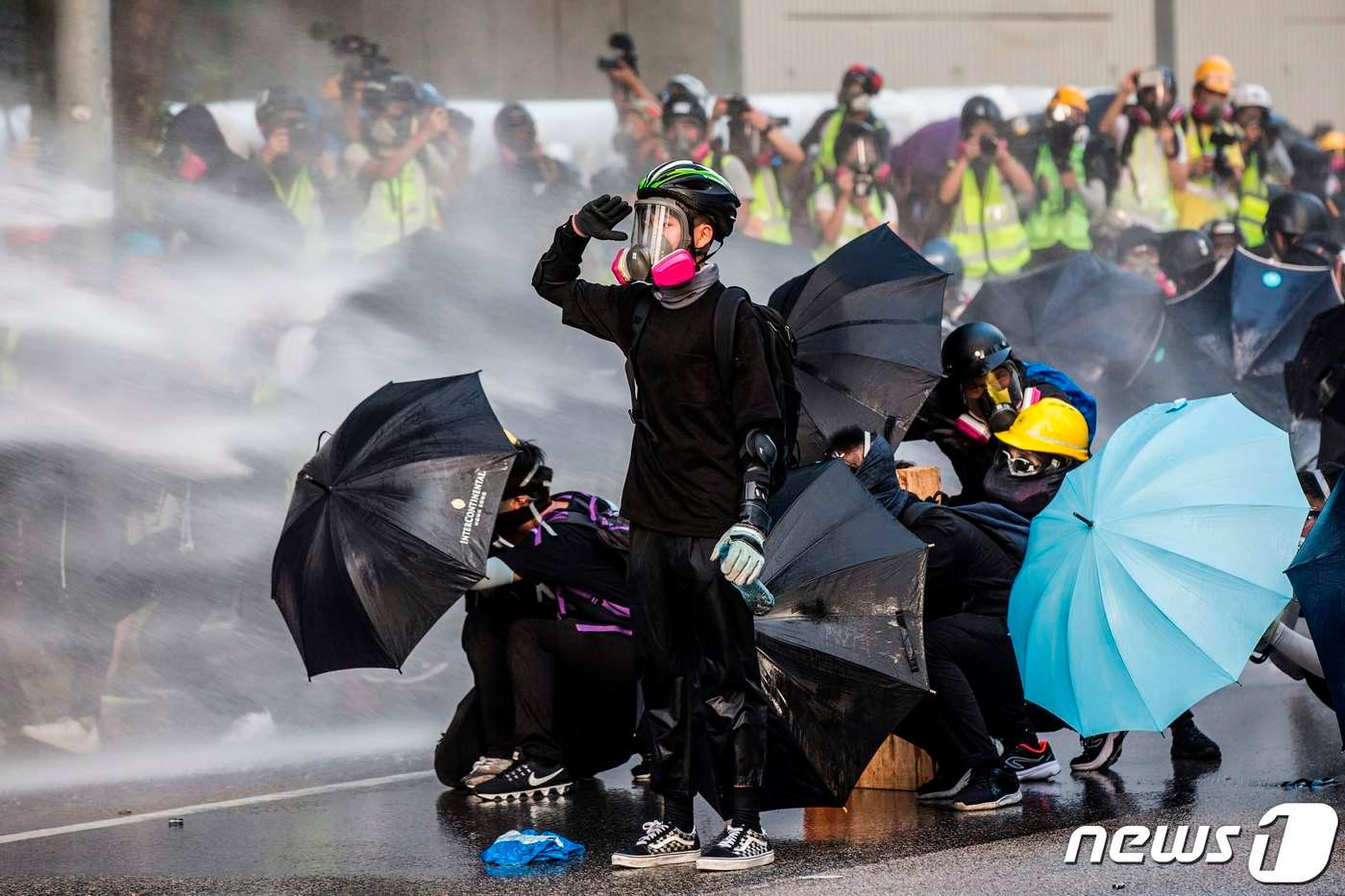 본문 이미지 - 지난 2019년 홍콩 시민들이 우산을 들고 민주화 시위를 벌였다. ⓒ AFP=뉴스1 ⓒ News1 정윤영 기자