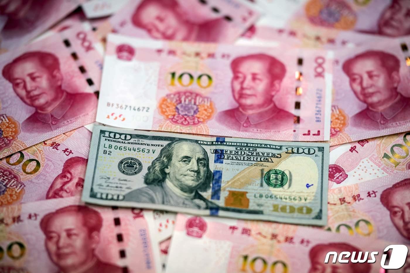 미국 달러와 중국 위안화 지폐ⓒ AFP=뉴스1