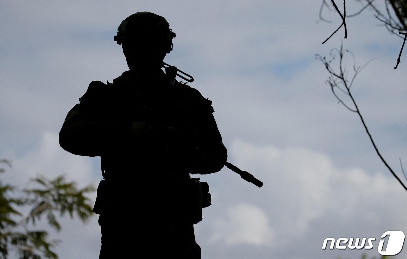 지난 2017년 7월13일&#40;현지시간&#41; 호주 북동부 퀸즐랜드에서 호주와 미국의 탈리스만 세이버 합동훈련에 한 호주군 병사가 참여하고 있는 모습. 2017.07.13/뉴스1 ⓒ 로이터=뉴스1 ⓒ News1 김민수 기자