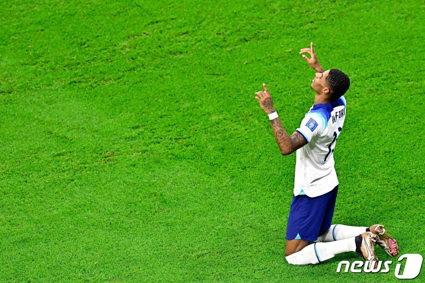 웨일스와 경기에서 선제골을 넣고 세리머니를 하는 래시포드. ⓒ AFP=뉴스1