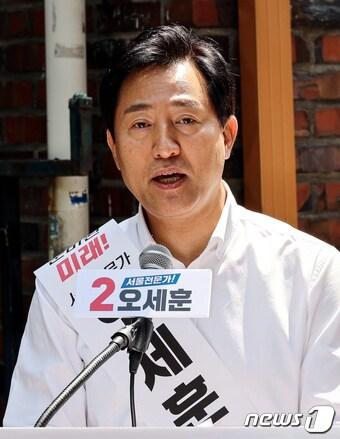 본문 이미지 - 오세훈 국민의힘 서울시장 후보가 12일 서울 구로구 개봉3구역에서 제8회 전국동시지방선거 서울시장 출마를 선언하고 있다. 2022.5.12/뉴스1 ⓒ News1 국회사진취재단