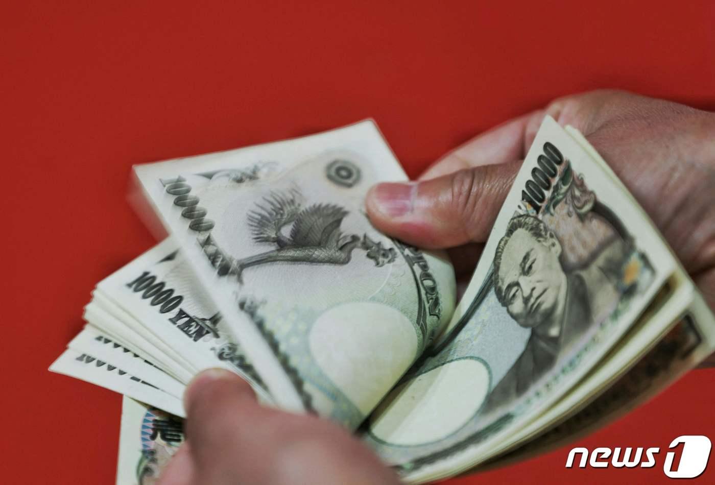 본문 이미지 - 일본 엔화 지폐ⓒ AFP=뉴스1