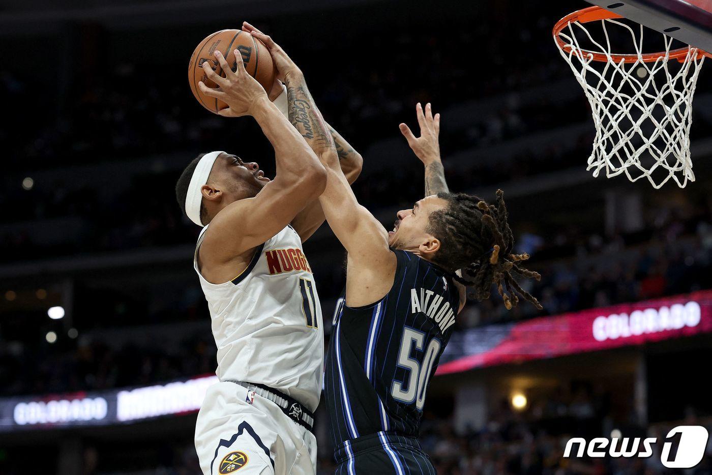 덴버가 올랜도를 꺾고 홈 13연승을 질주했다. ⓒ AFP=뉴스1