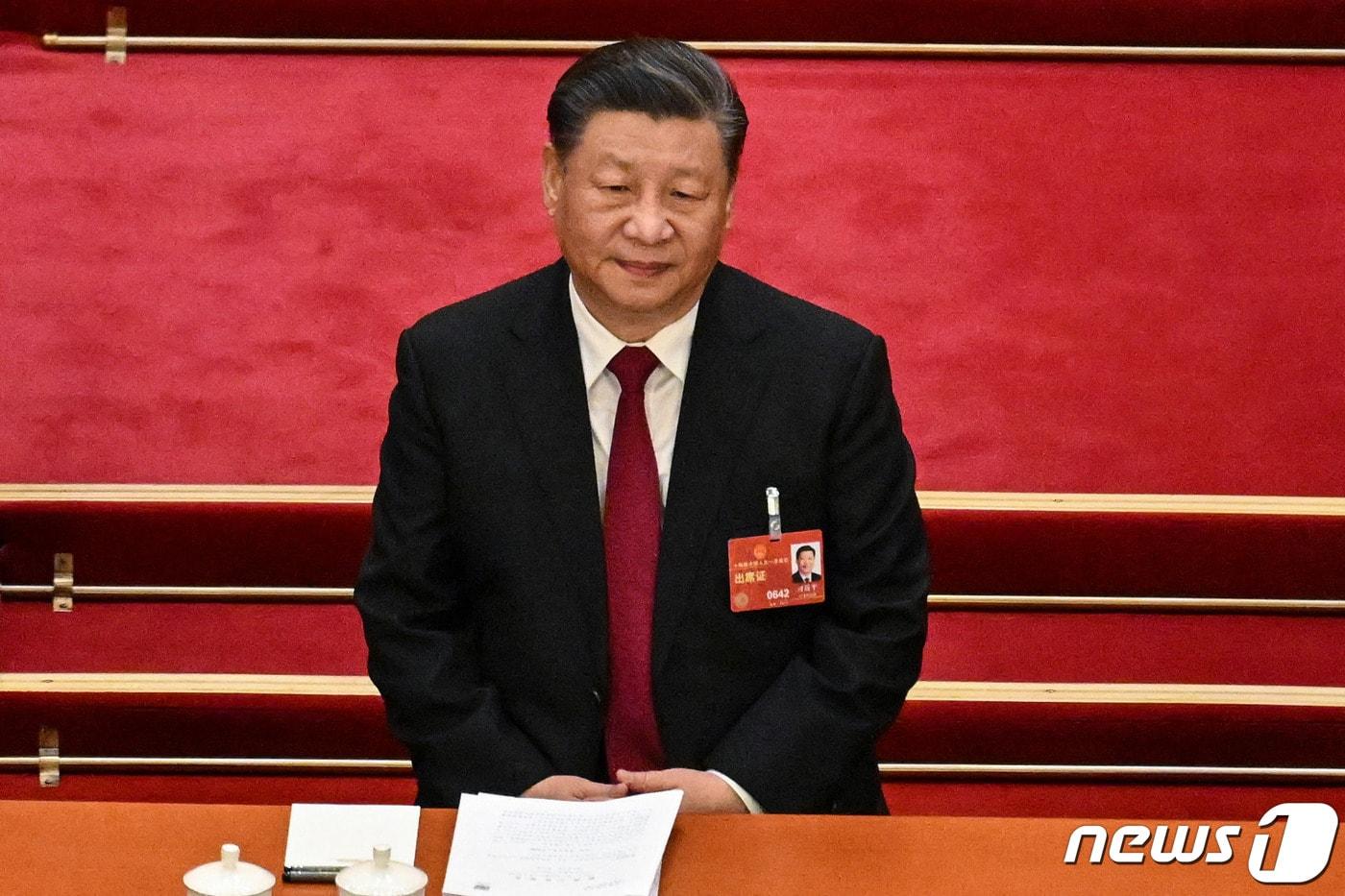 시진핑 중국 국가 주석이 5일 (현지시간) 베이징 인민대회당에서 열린 전국인민대표대회(전인대) 연례회의 개막식에 무표정한 모습으로 참석을 하고 있다. ⓒ AFP=뉴스1 ⓒ News1 우동명 기자