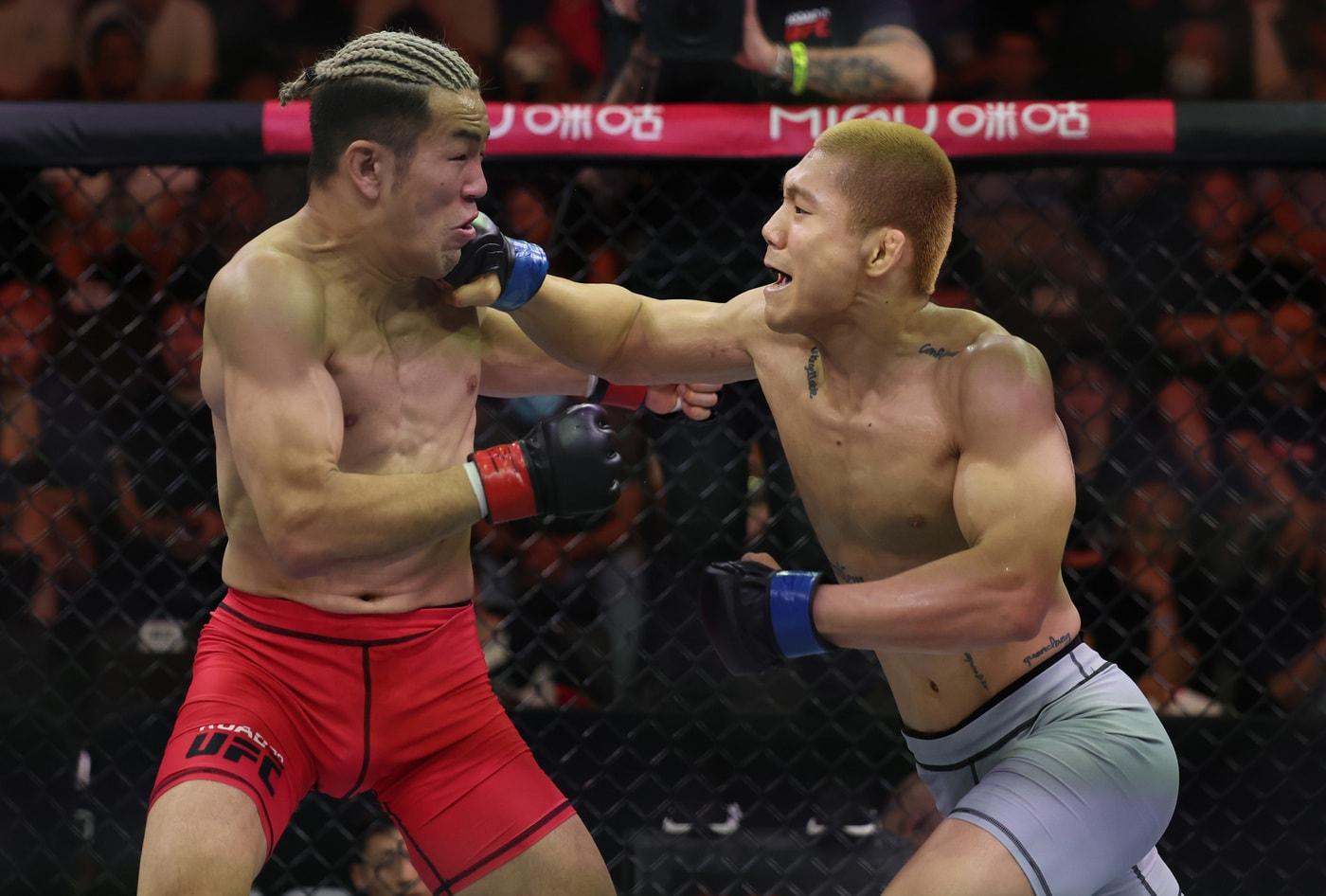 김상원이 케이스케를 꺾고 ROAD TO UFC 4강에 올랐다. (오른쪽) (UFC 제공)