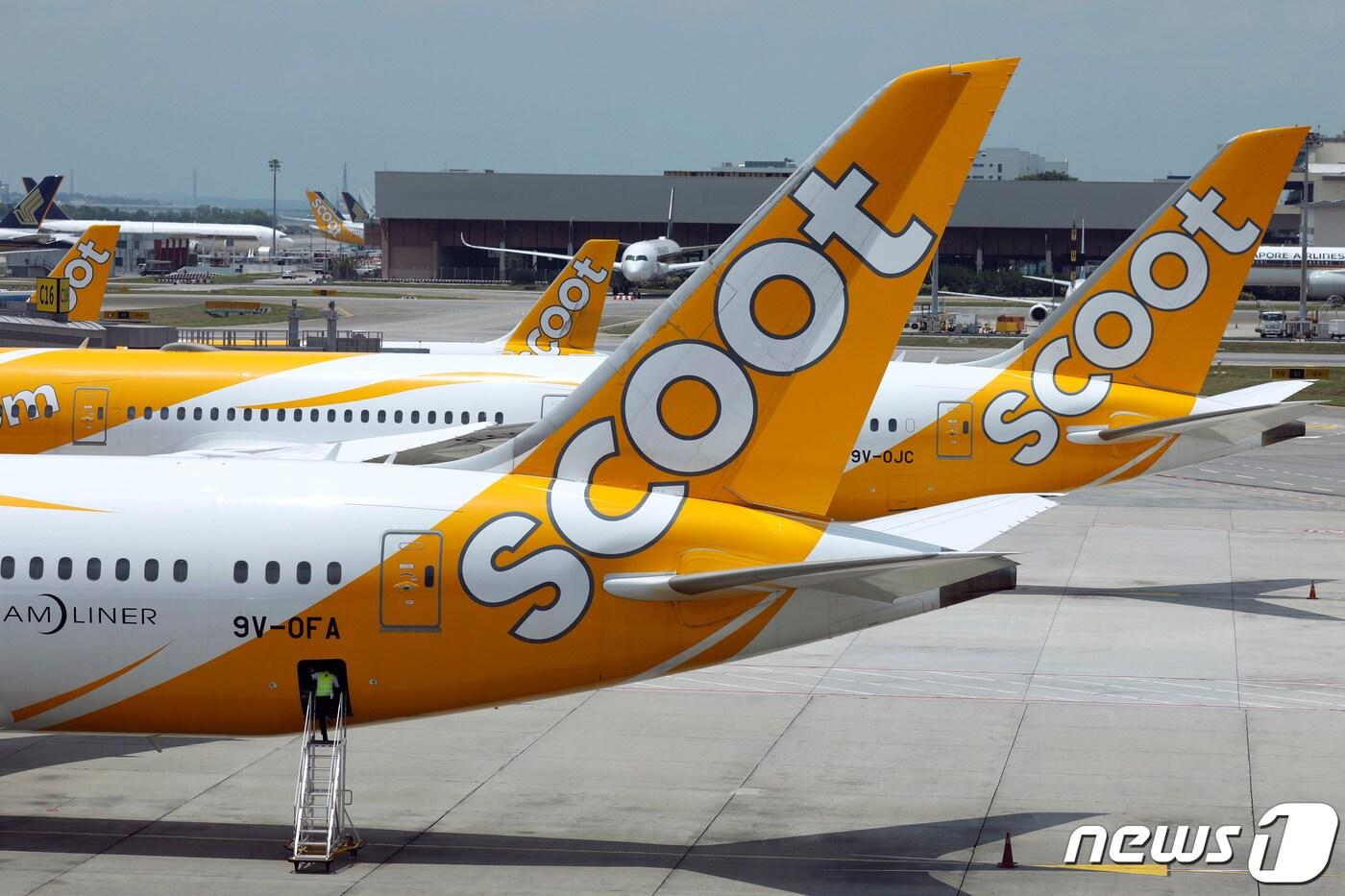 스쿠트항공 여객기가 싱가포르 창이공항에 착륙해 있다. 2023.3.30 ⓒ 로이터=뉴스1 ⓒ News1 강민경 기자