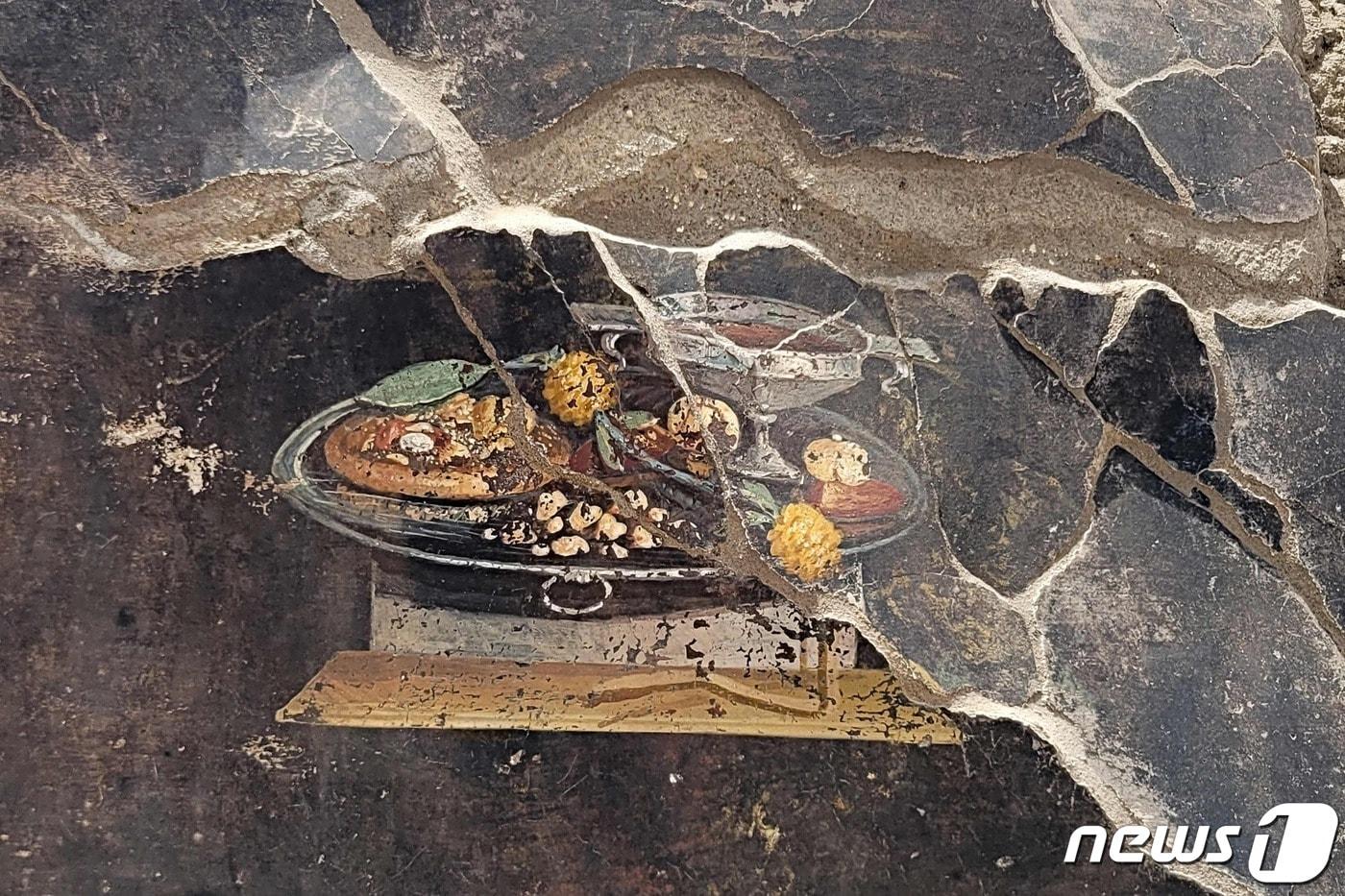본문 이미지 - 고대 로마 폼페이오 도시 유적에서 피자로 추정되는 음식 그림이 발견됐다. (사진은 기사 내용과 무관함)  ⓒ AFP=뉴스1 ⓒ News1 김성식 기자
