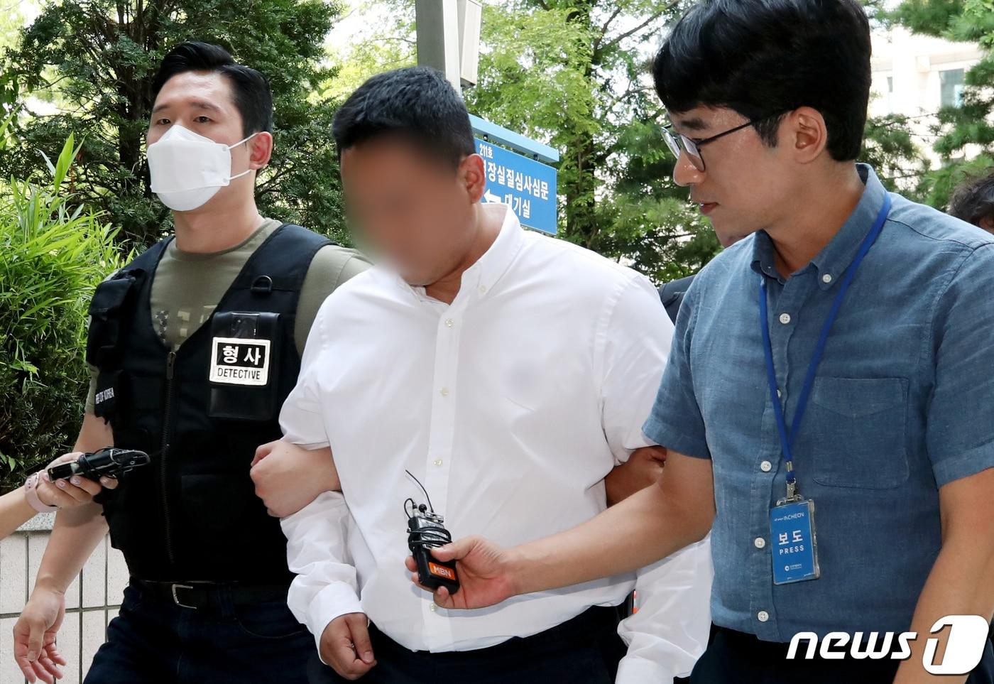 본문 이미지 - 주차장에서 차량을 빼달라고 요구한 여성을 무차별 폭행한 혐의(공동상해)를 받는 30대 전 보디빌더. 2023.7.10/뉴스1 ⓒ News1 정진욱 기자