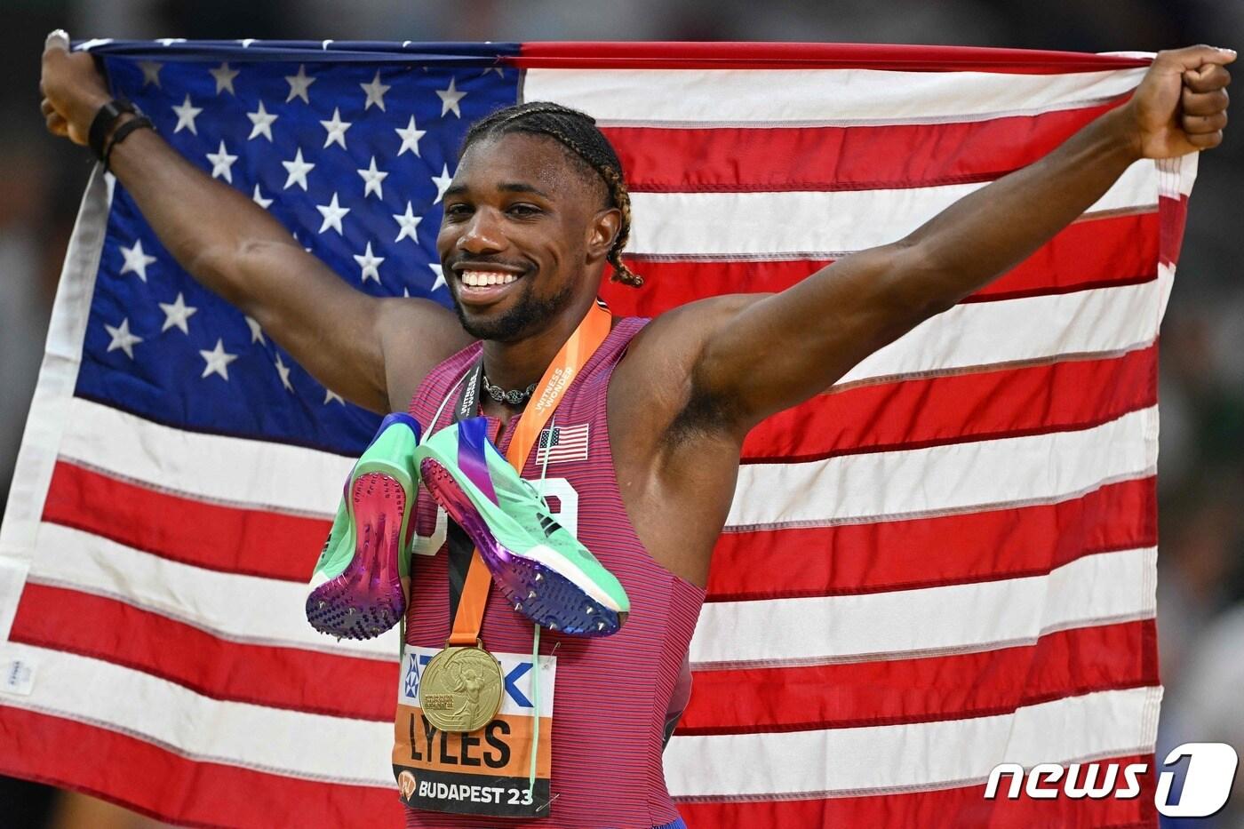 본문 이미지 - 세계선수권 200m 정상에 오른 라일스ⓒ AFP=뉴스1