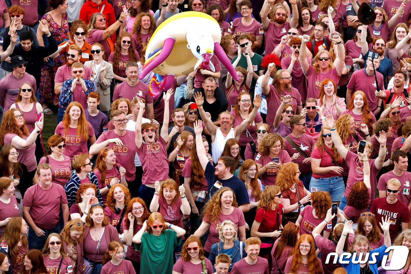 27일(현지시간) 전 세계 인구의 1~2%밖에 안 되는 '빨간 머리' 수천명이 네덜란드 남부 틸부르흐에서 연례 '빨간 머리의 날' 축제에 참여해 네덜란드를 붉게 물들였다. 2023.08.27/ ⓒ 로이터=뉴스1 ⓒ News1 박재하 기자