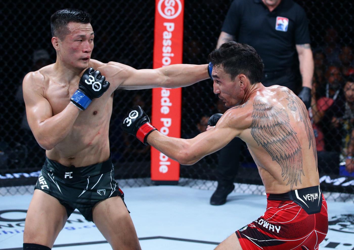 정찬성(왼쪽)은 할로웨이전 이후 MMA 은퇴를 선언했다.(UFC 제공)