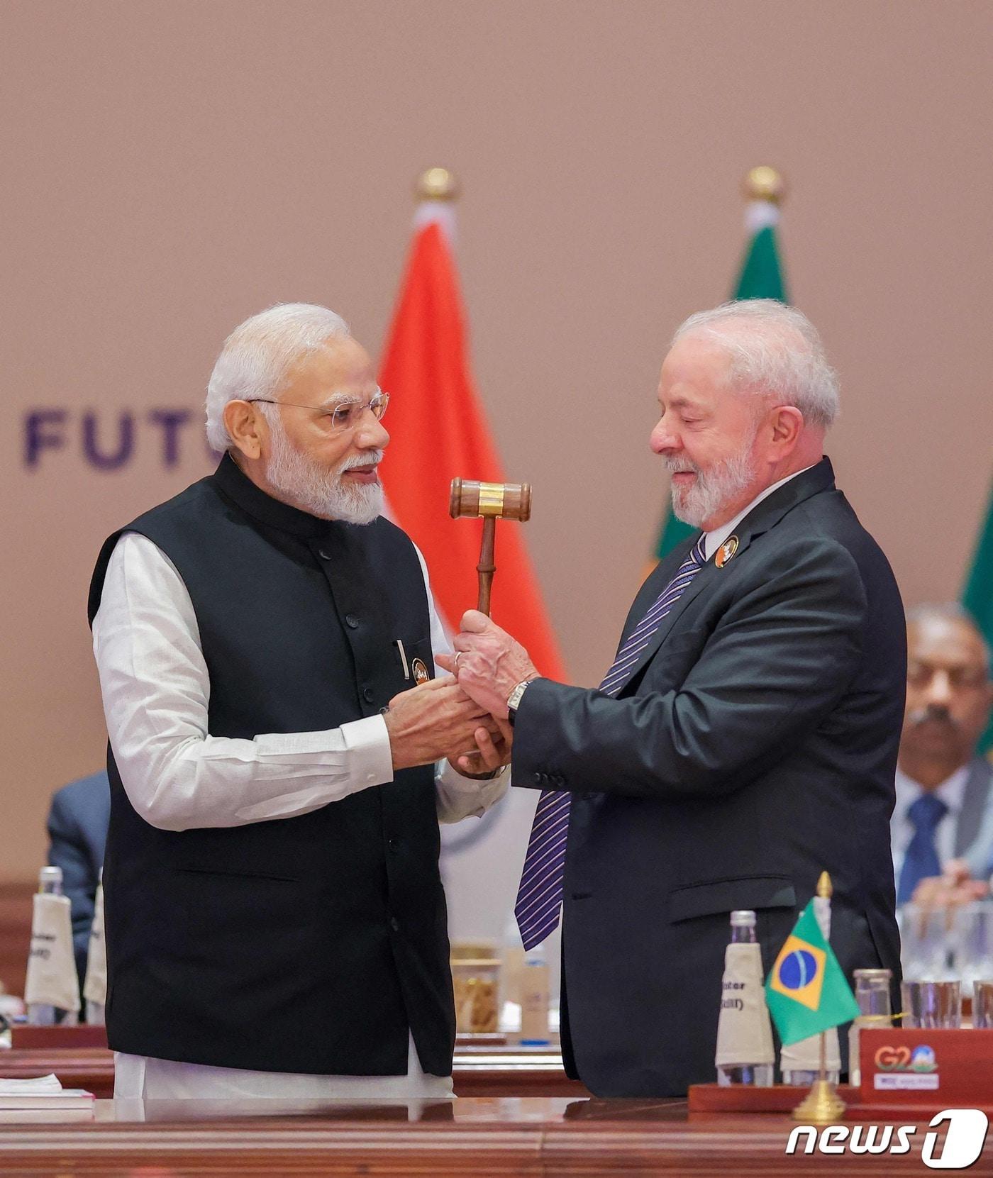 본문 이미지 - 나렌드라 모디 인도 총리&#40;왼쪽&#41;와 루이스 이나시우 룰라 다 시우바 브라질 대통령&#40;오른쪽&#41;. &lt;자료사진&gt; ⓒ AFP=뉴스1 ⓒ News1 김민수 기자