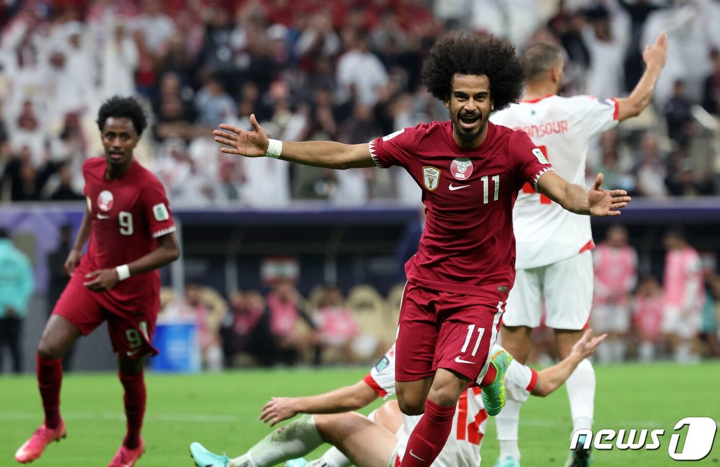 카타르 아피프가 12일(현지시간) 카타르 루사일 스타디움에서 열린 2023 아시아축구연맹(AFC) 카타르 아시안컵 개막전 카타르와 레바논의 경기에서 선제골을 넣은 후 기뻐하고 있다. 2024.1.13/뉴스1 ⓒ News1 김성진 기자