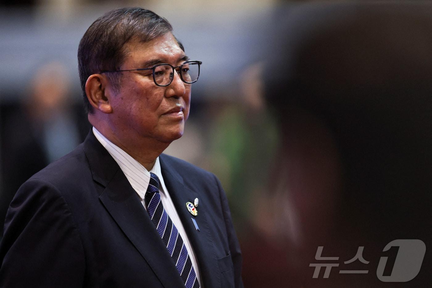 본문 이미지 - 10일(현지시간) 라오스 비엔티안 국립 컨벤션 센터에서 이시바 시게루 일본 총리가 제27차 아세안+3 정상회의에 참석하고 있다. 2024.10.10/ ⓒ 로이터=뉴스1 ⓒ News1 권진영 기자