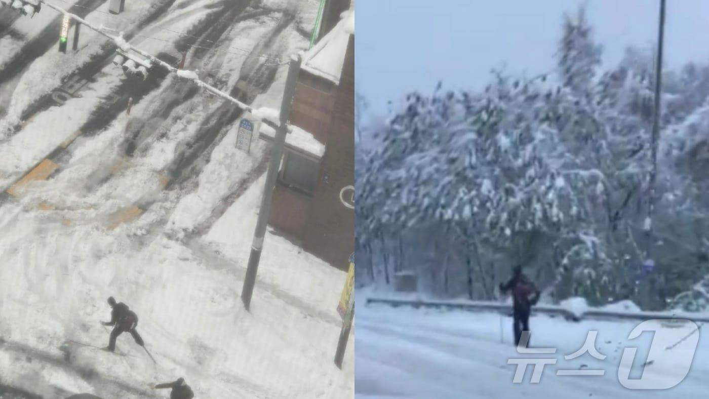 적설량이 40㎝를 넘는 등 폭설이 내린 28일 오전 8시30분쯤 경기 용인시의 한 도로에서 한 시민이 스키를 타고 도로를 이동하는 모습이 목격됐다. (독자 제공)