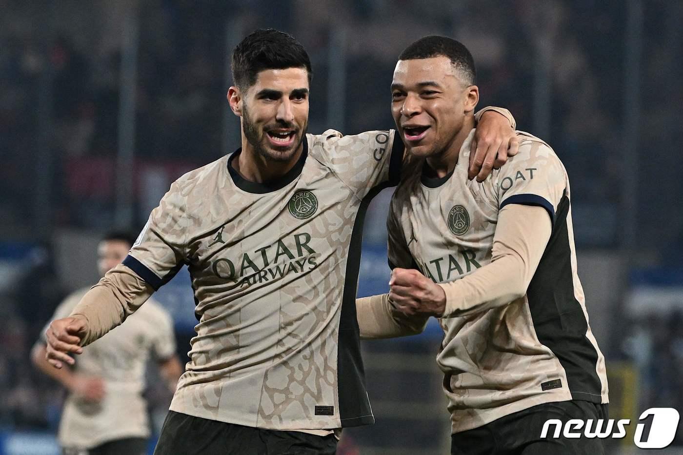 킬리안 음바페(오른쪽)와 마르코 아센시오. ⓒ AFP=뉴스1