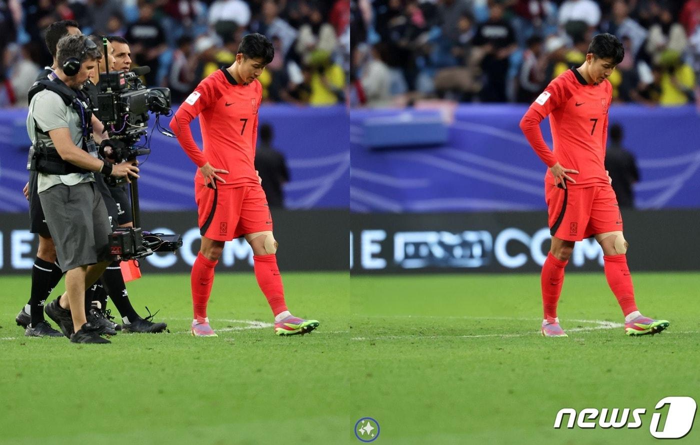 갤럭시S24 생성 인공지능(AI) 기능으로 편집한 사진. 편집된 사진 하단에 인공지능으로 생성했다는 워터마크가 추가됐다.(파란 동그라미는 강조용). 사진 원본은 대한민국 축구대표팀 손흥민 선수가 25일(현지시간) 2023 아시아축구연맹(AFC) 카타르 아시안컵 대한민국과 말레이시아의 경기에서 3-3 무승부를 기록한 후의 모습. (뉴스1 김성진 기자 촬영) 2024.02.09 /뉴스1