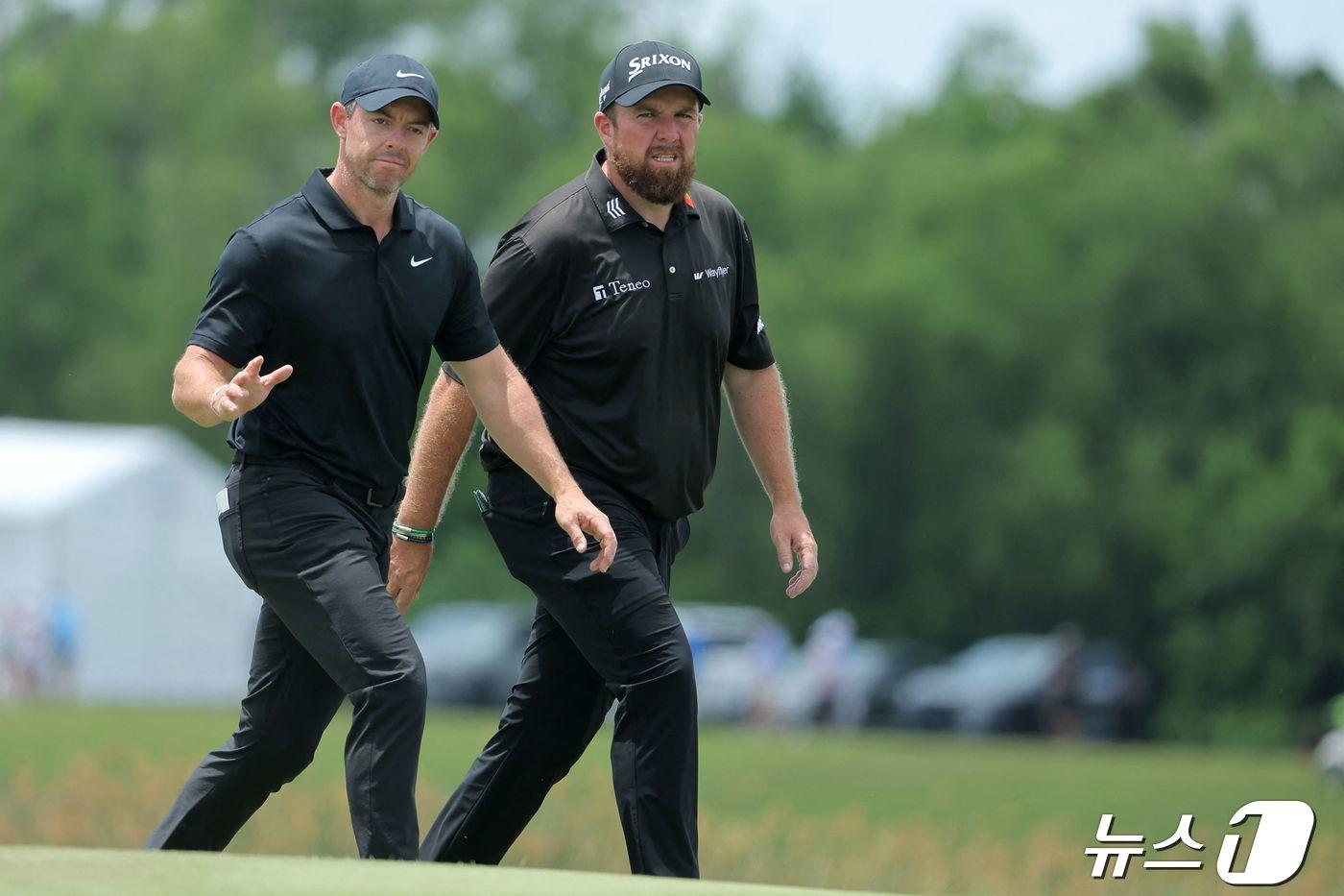 PGA 취리히 클래식 둘째날 공동 선두를 유지한 매킬로이(왼쪽)와 라우리. ⓒ AFP=뉴스1
