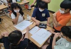 본문 이미지 - 어린이들이 대피지도를 그리는 모습. (행안부 제공)ⓒ 뉴스1