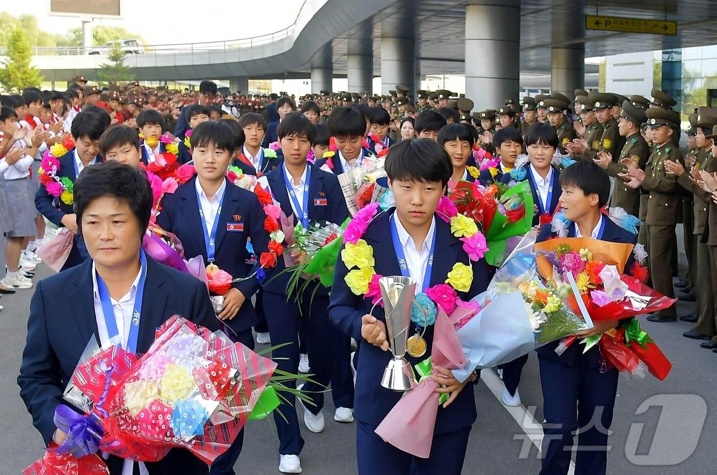(평양 노동신문=뉴스1) = 2024년 아시아축구연맹(AFC) 17세 미만(U-17) 여자 아시안컵 경기대회에서 우승한 북한 여자축구선수들. [국내에서만 사용가능. 재배포 금지. DB 금지. For Use Only in the Republic of Korea. Redistribution Prohibited] rodongphoto@news1.kr