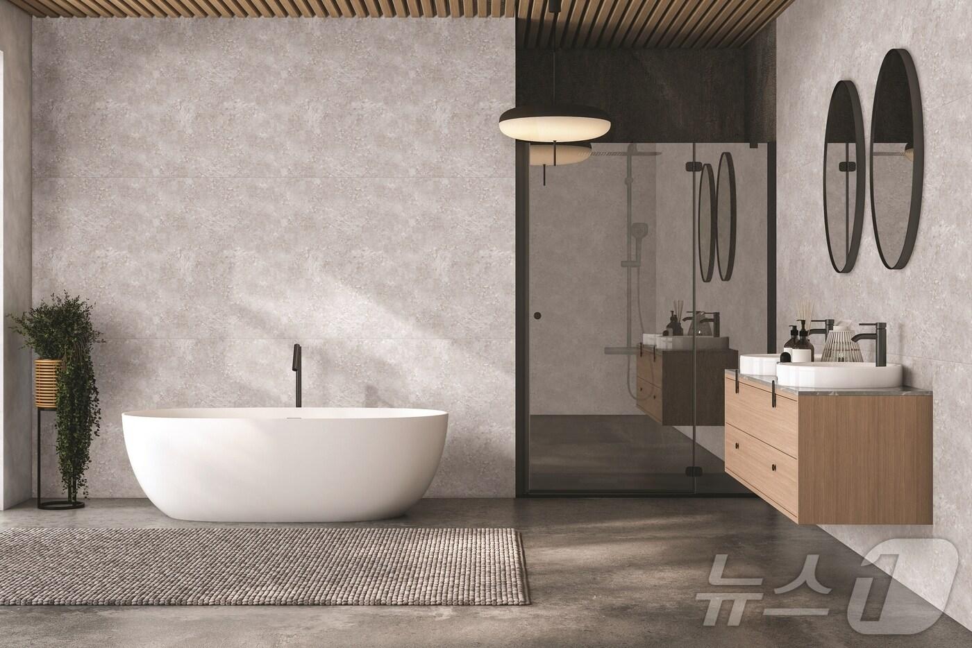 욕실 벽면에 현대L&C '보닥 스톤보드'를 적용한 모습(현대L&C 제공)